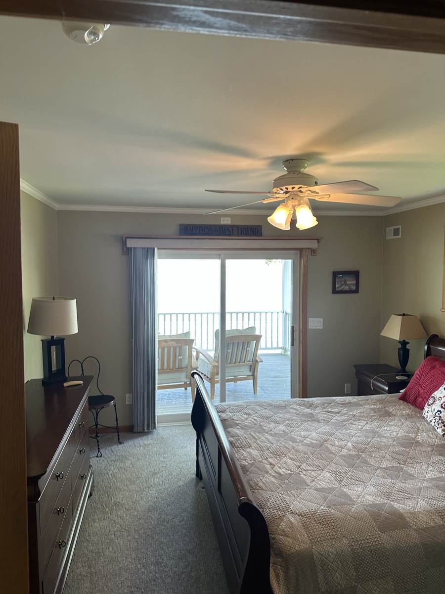 Bedroom with a sliding door onto the porch