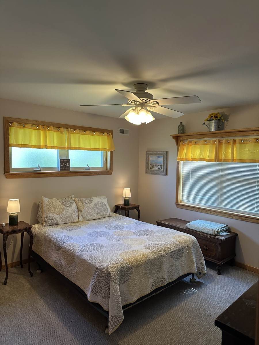 Bright bedroom with sunny yellow accents