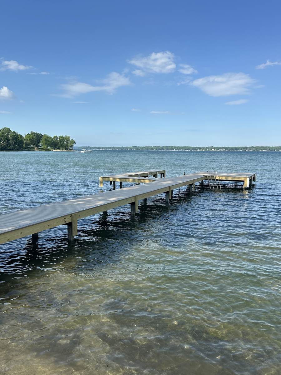 The dock reaching out into Cayuga Lake