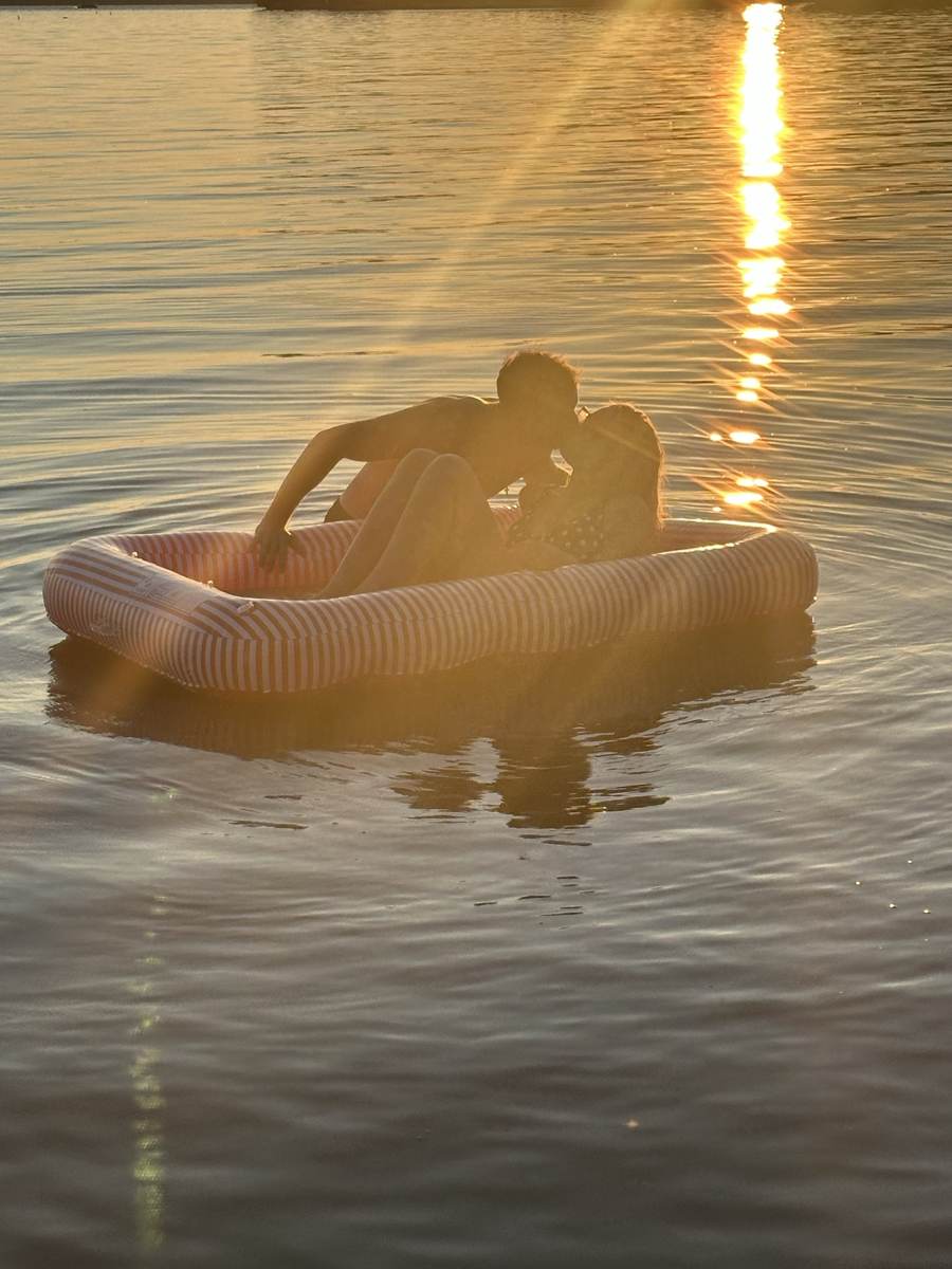 Floating on the lake at sunset